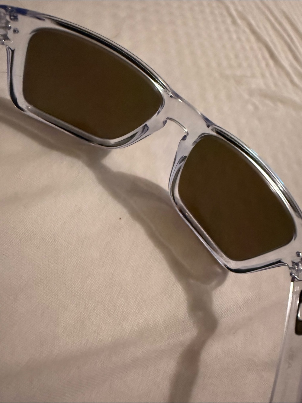 Oakley Clear Frame Sunglasses with Brown Lenses